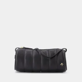 Manu Atelier  Padded Cylinder Bag in Black Leather