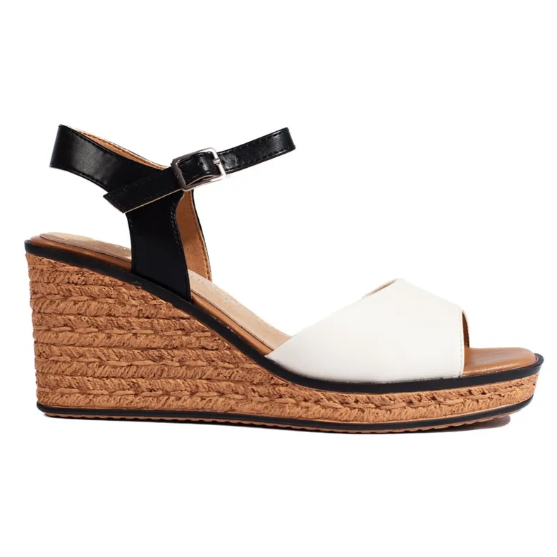 Women's white wedge sandals by Sergio Leone